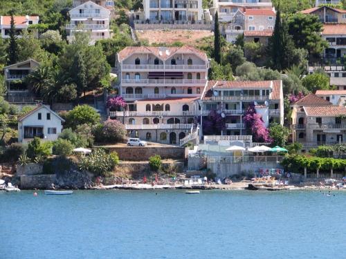 a view of a resort from the water at Apartments Sofija in Tivat