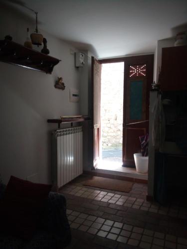 a room with a door leading to a window at Calì B&B in Alatri