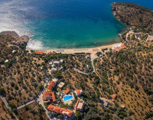 an aerial view of a beach and the ocean at Limnionas Bay Village Hotel in Marathokampos