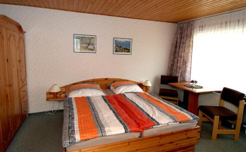 Postel nebo postele na pokoji v ubytování Wiedaer Hütte