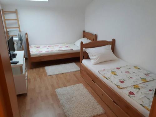 Renome apartmaniにあるベッド