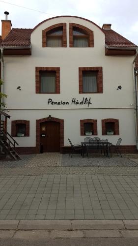 a building with a sign that reads passion helix at Penzion Hádlík in Velké Pavlovice