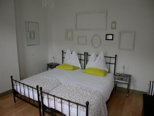 Cama o camas de una habitación en B&B Het Venloos Plekje