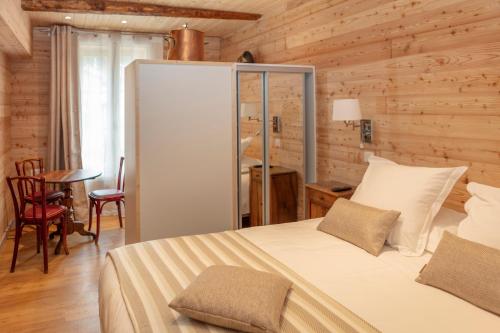 เตียงในห้องที่ Relais Des Alpes