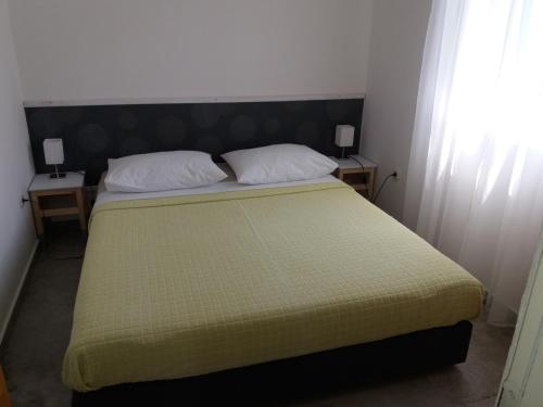 Una cama o camas en una habitación de Apartments Jure