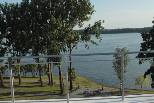a view of a body of water from a building at EGZOTYCZNO - ROMANTYCZNE miejsce dla DWOJGA in Ełk