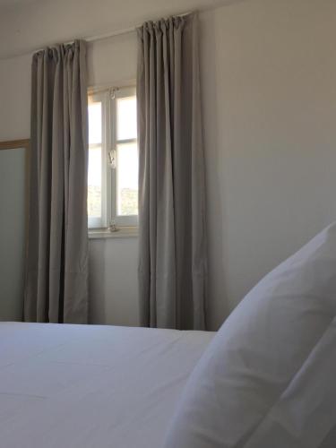 Gallery image of Island White in Agios Georgios
