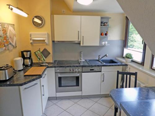 Kuchyň nebo kuchyňský kout v ubytování Peedy's luxuriöse 60m² Wohnung mit Balkonterrasse