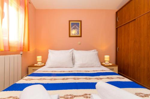 Postel nebo postele na pokoji v ubytování Holiday home Ana