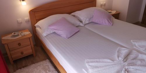 Katil atau katil-katil dalam bilik di Apartments Bošković