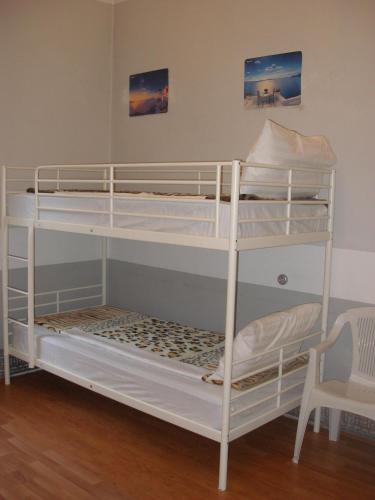 a couple of bunk beds in a room at Kretan Hostel in Bucharest