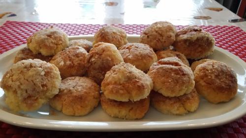 a plate of muffins on top of a table at La Casa Del Grillo 1 in Aosta