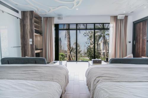 Кровать или кровати в номере Villa LOHERB