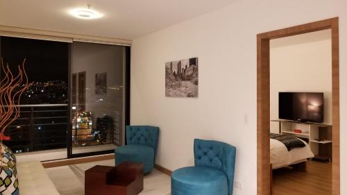 Luxury Residence Suitesにあるテレビまたはエンターテインメントセンター