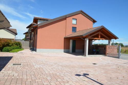 a brick driveway in front of a house at Eco-Residence in Casale Monferrato