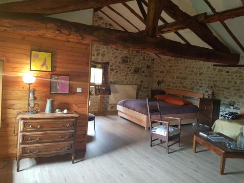 Postel nebo postele na pokoji v ubytování Chambres et Table d'hôtes Il Fut Un Temps...