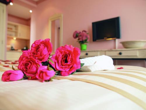 Aparthotel Am Meerにあるベッド