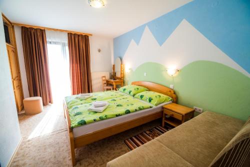 Postel nebo postele na pokoji v ubytování Bed & Breakfast Hisa Resje