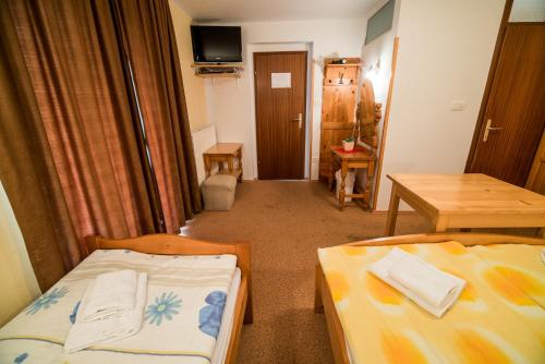 Ένα ή περισσότερα κρεβάτια σε δωμάτιο στο Bed & Breakfast Hisa Resje