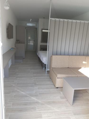 Кровать или кровати в номере Thassos Imperial Resort