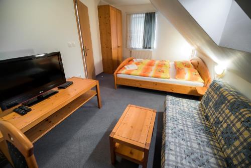 En eller flere senger på et rom på Bed & Breakfast Hisa Resje