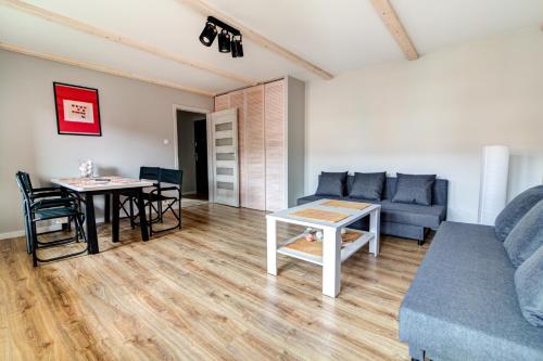 พื้นที่นั่งเล่นของ Apartament Halinka salon, sypialnia, kuchnia, balkon Powierzchnia 50m