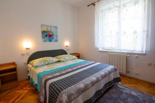 Cama o camas de una habitación en Vila Niko
