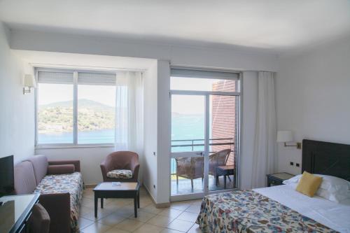 Letto o letti in una camera di TH Capoliveri - Grand Hotel Elba International