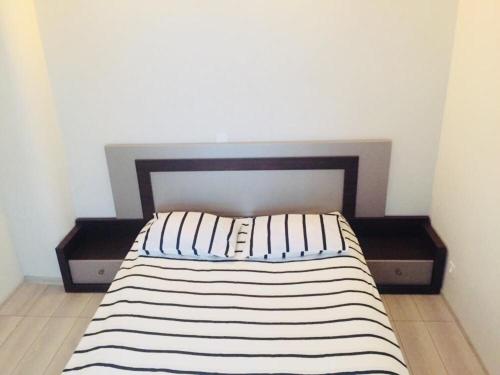 Ein Bett oder Betten in einem Zimmer der Unterkunft Apartment Soho Tabidze