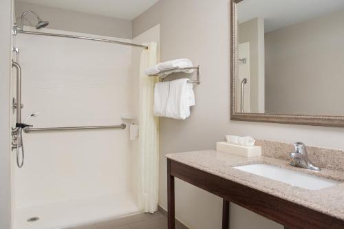 a bathroom with a sink and a shower at Best Western York Inn in York
