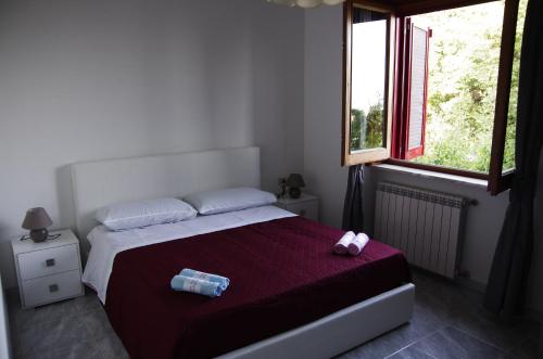 Krevet ili kreveti u jedinici u okviru objekta Casa vacanze villa Pellegrino
