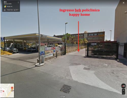 una imagen de una gasolinera con las palabras camas de emergencia polinización hogar feliz en Policlinico Happy Home, en Messina