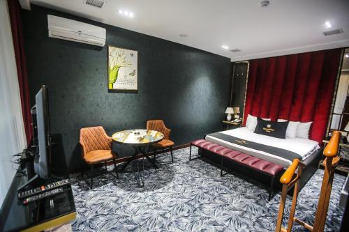Armada Villa Hotelにあるベッド
