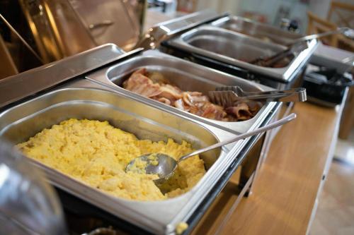a buffet with some food in a buffet at Soho Boutique Las Vegas in Málaga