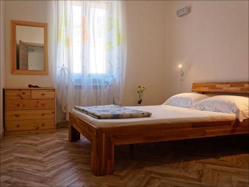 Llit o llits en una habitació de La Corte di ValEmi