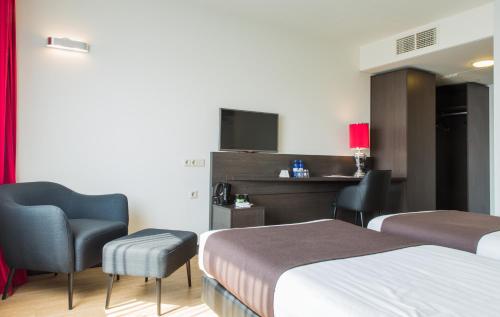 Кровать или кровати в номере Best Western Plus Amsterdam Airport Hotel
