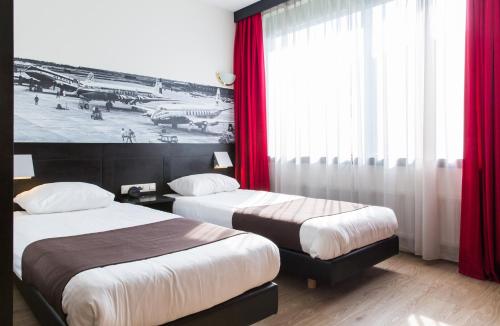 Krevet ili kreveti u jedinici u okviru objekta Best Western Plus Amsterdam Airport Hotel