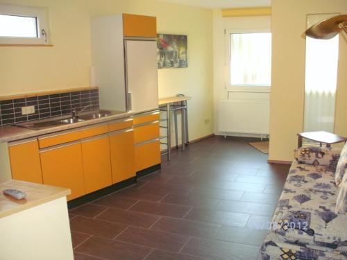 Kuchyň nebo kuchyňský kout v ubytování Hotel am Hindenburgplatz