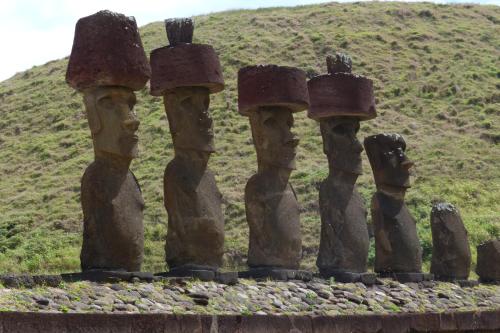 a group of statues of people standing on a hill at Cabaña Kaiheke in Hanga Roa