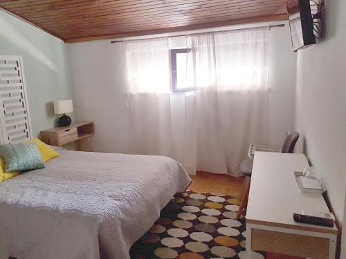 Ένα ή περισσότερα κρεβάτια σε δωμάτιο στο Casa70