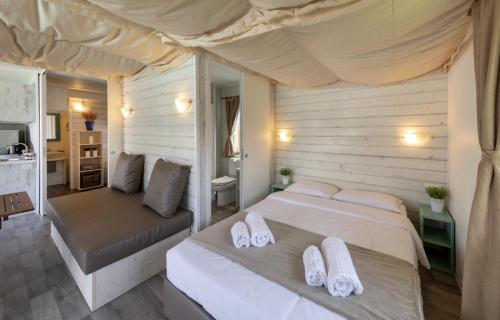 Tempat tidur dalam kamar di Il Borgo delle Arti
