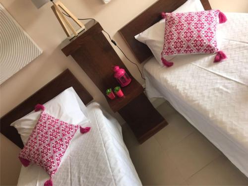 Łóżko lub łóżka w pokoju w obiekcie Apartamento TT Ocean - Herdade dos Salgados