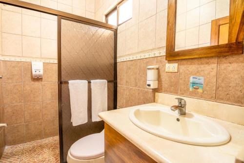 Kylpyhuone majoituspaikassa Hotel Pacuare