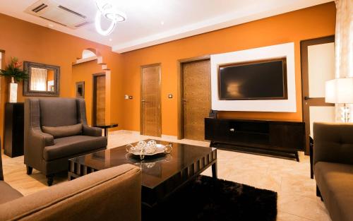 Χώρος καθιστικού στο Oak Plaza Suites