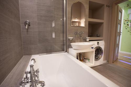 Kúpeľňa v ubytovaní Warsaw Concierge Traveller's Nest Wspólna