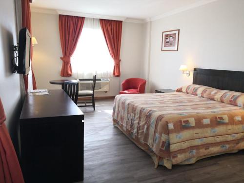 Hotel Diego De Almagro Rancaguaにあるベッド