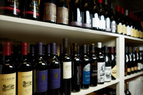 a shelf filled with lots of bottles of wine at Sunnyside Resort and Lodge in Tahoe City