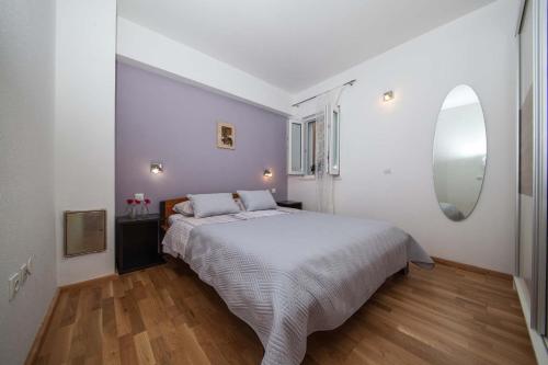 Posteľ alebo postele v izbe v ubytovaní Apartment Sarena