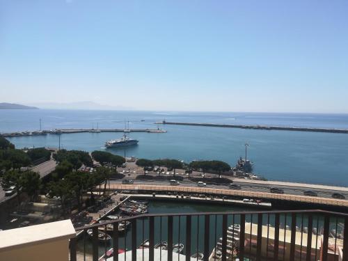a view of a harbor with a boat in the water at Guest House Domus Cicerone in Formia