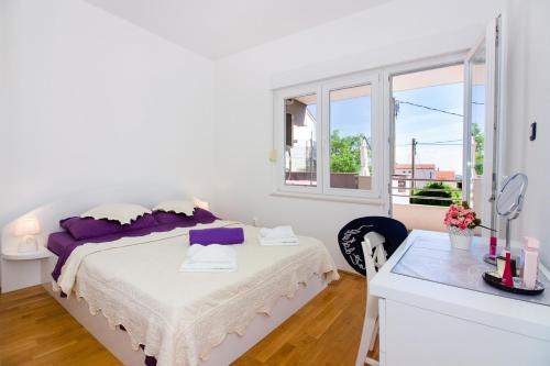 Posteľ alebo postele v izbe v ubytovaní Apartment Villa Rina- Heated salt water Pool